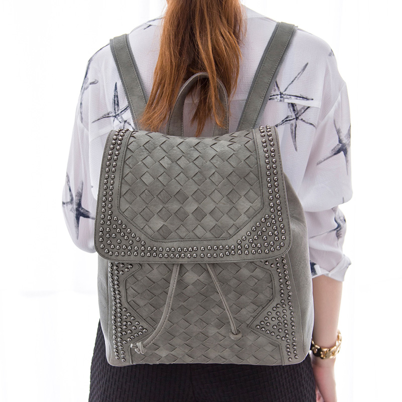 2015 new fashion woven backpack Korean star rivet bag