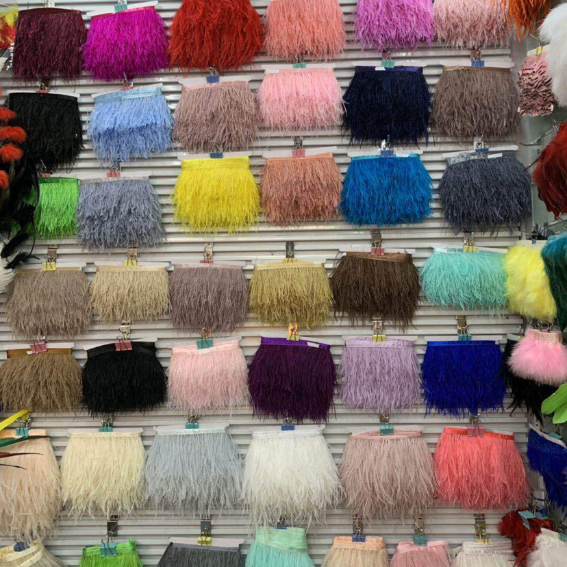 The manufacturer sells 10-15cm single layer ostrich hair cloth with edge clothing and wedding dress with edge feather decoration