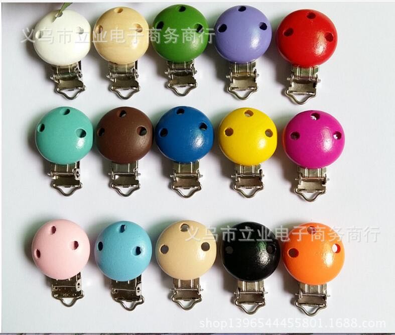 Manufacturers make wooden pacifiers for babies