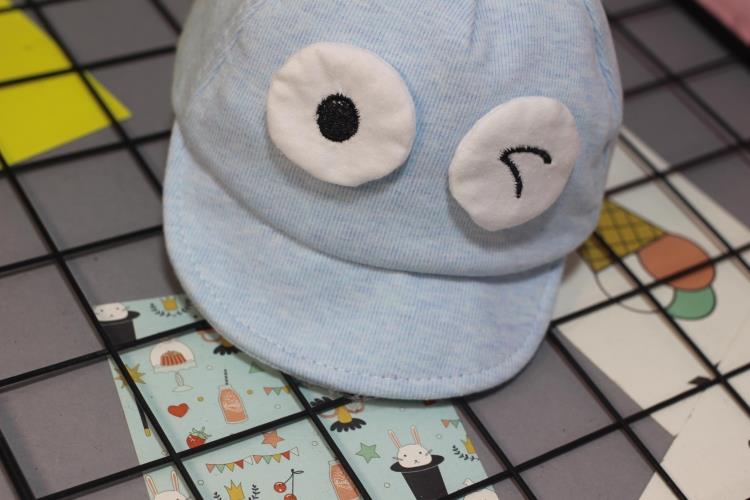 South Korean version of the new children's pure cotton pointy end of a soft cornice cap and baby pacifiers. South Korean version of the new children's pure cotton pointy end of a soft cornice cap and baby pacifiers.