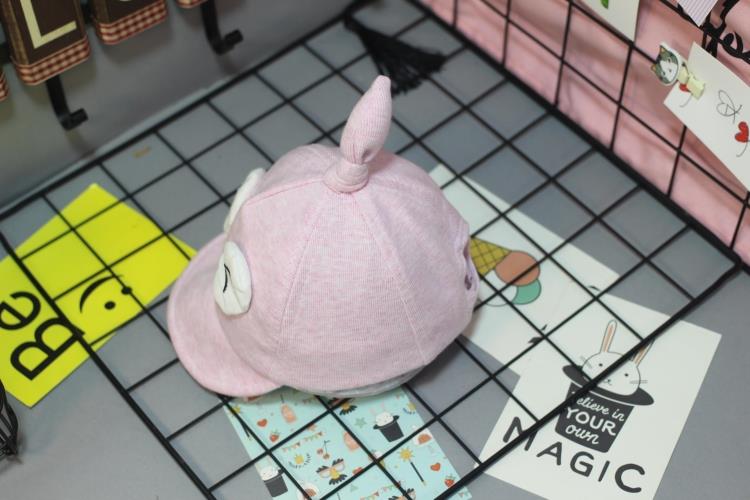 South Korean version of the new children's pure cotton pointy end of a soft cornice cap and baby pacifiers. South Korean version of the new children's pure cotton pointy end of a soft cornice cap and baby pacifiers.
