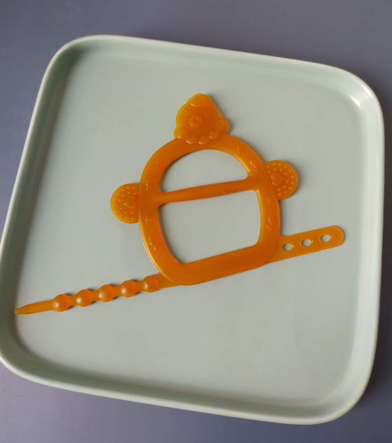 The manufacturer directly sells baby silicone toothbracelet tooth glue glove molar braces type baby bite glue tooth glue