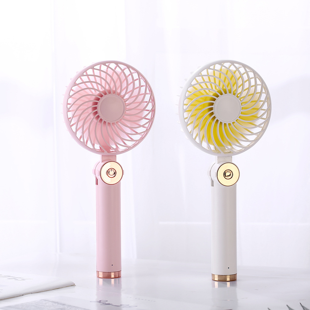 Rotary folding small fan USB charging handheld mini desktop small fan with charging pad function Rotary folding small fan USB charging handheld mini desktop small fan with charging pad function