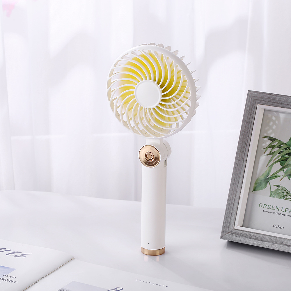 Rotary folding small fan USB charging handheld mini desktop small fan with charging pad function Rotary folding small fan USB charging handheld mini desktop small fan with charging pad function