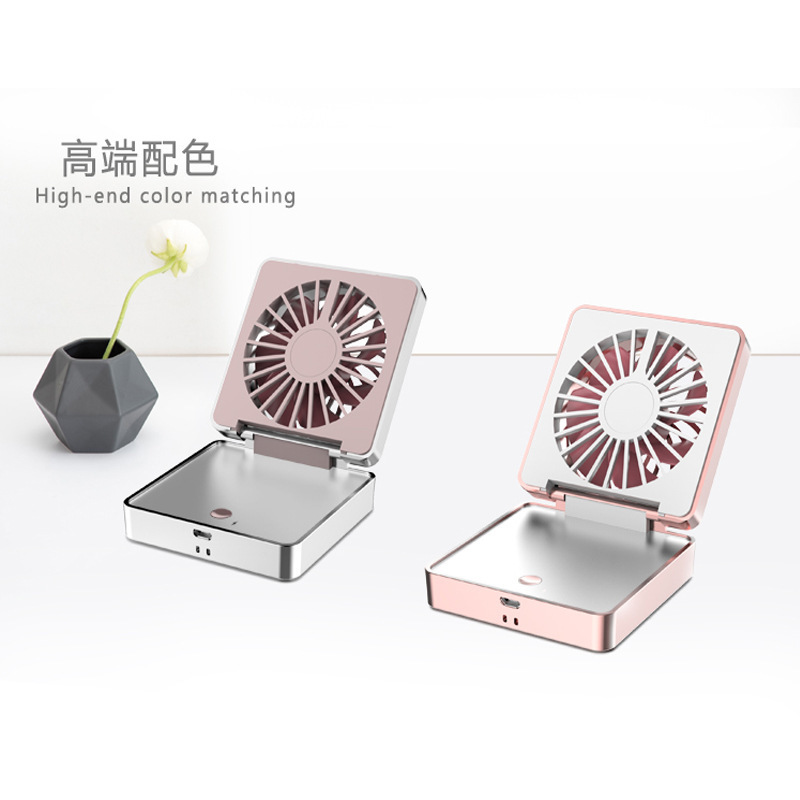The New folding pocket fan usb charging mini handheld fan student portable mirror small fan manufacturer