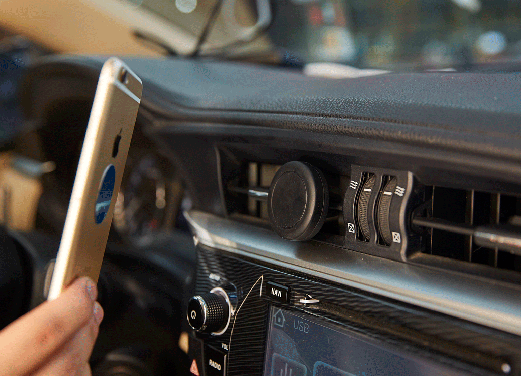 Car bracket mobile phone magnet air conditioning outlet magnetic phone folder car