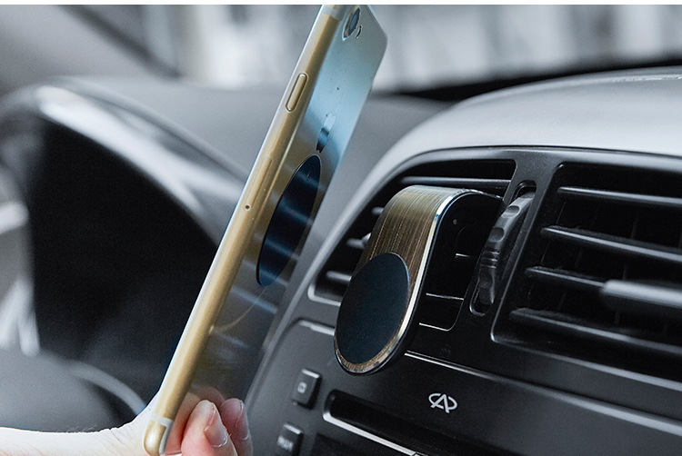 Creative Car Bracket Car Mobile Phone Universal Air Outlet Magnet Car Supplies Metal Navigator Magnetic Bracket
