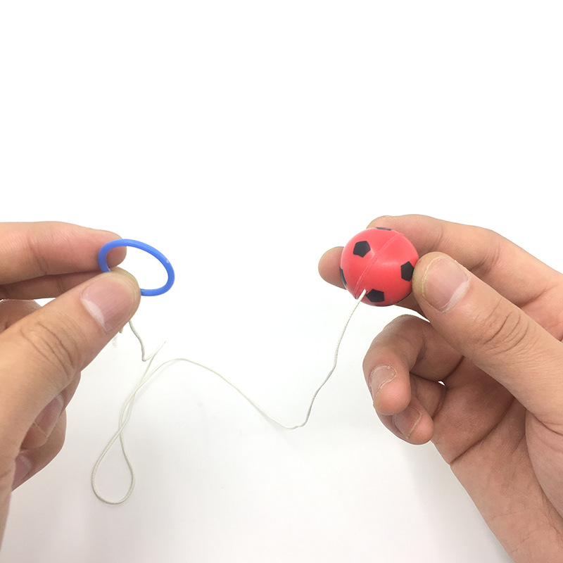 Ground toy with bungee ball wrist thrower throws toy ball twist egg ball