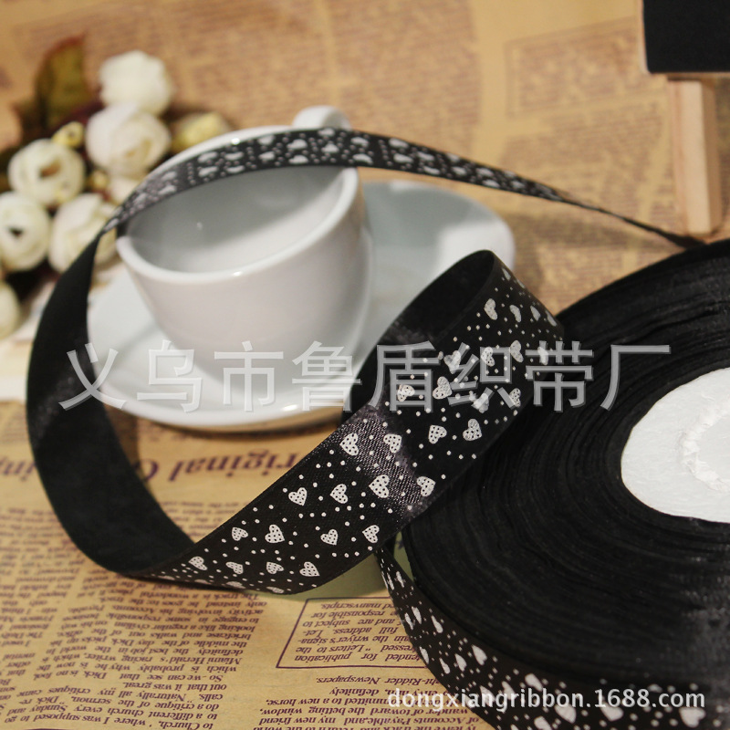Yiwu dongxiang, ribbon manufacturers straight rib belt printing text polyester belt printing.