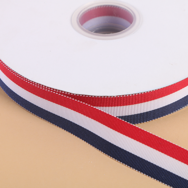 Red and white blue stripe ribbon ribbon ribbon clothing accessories.