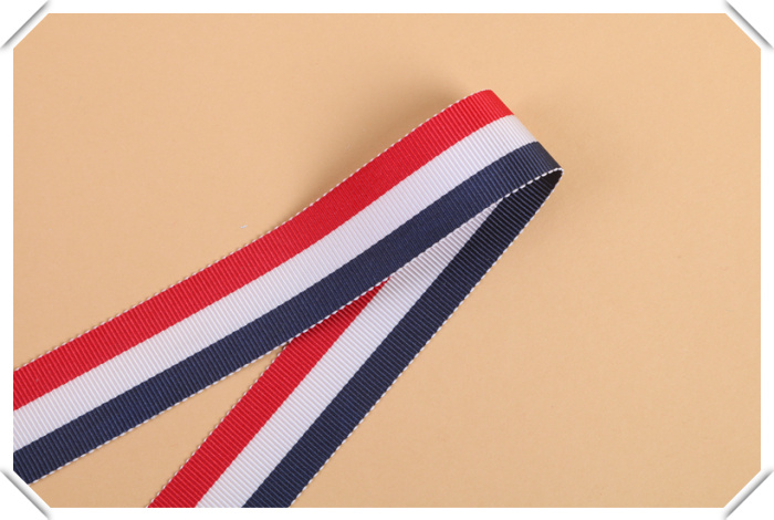 Red and white blue stripe ribbon ribbon ribbon clothing accessories.