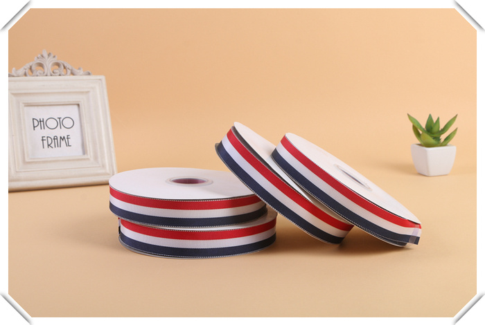 Red and white blue stripe ribbon ribbon ribbon clothing accessories.