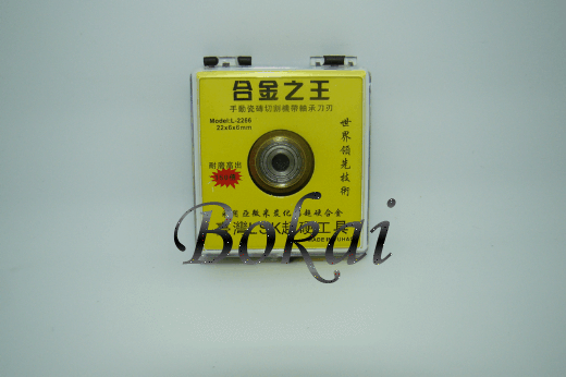 Manual ceramic tile cutting machine with a roller bearing a knife wheel with a knife wheel with a knife wheel