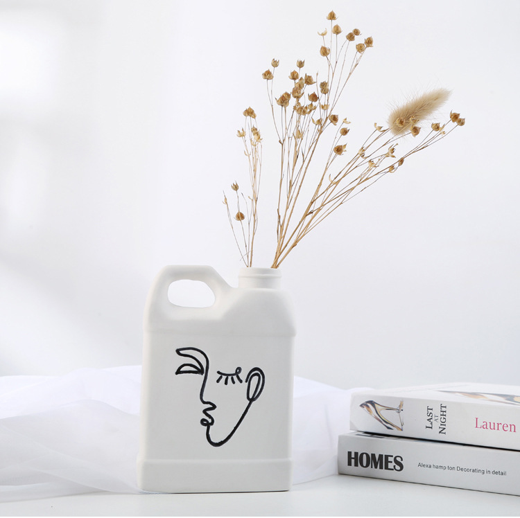 Creative European-Style White Ceramic Vase Decoration Home Ornament TV Cabinet Decoration Porcelain craft Creative European-Style White Ceramic Vase Decoration Home Ornament TV Cabinet Decoration Porcelain craft