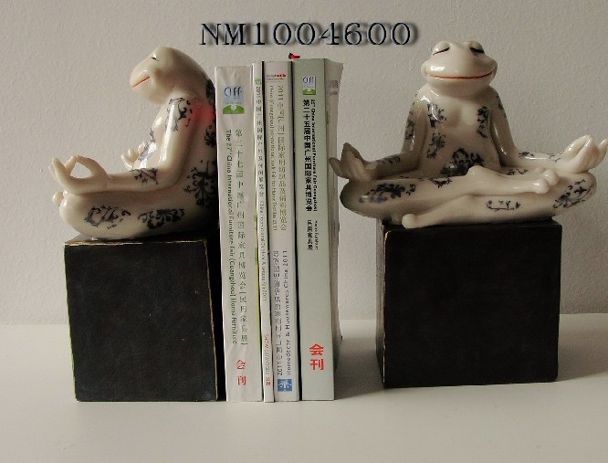 Modern continental Southeast Asian home decor frog bookends books