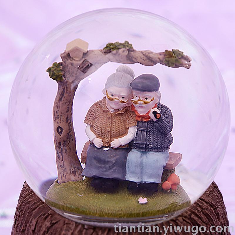 Resin crafts set up a couple old lady Crystal ball music box dream luminous snowflake music box