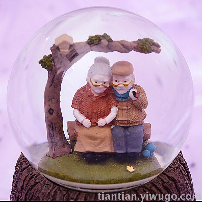 Resin crafts set up a couple old lady Crystal ball music box dream luminous snowflake music box