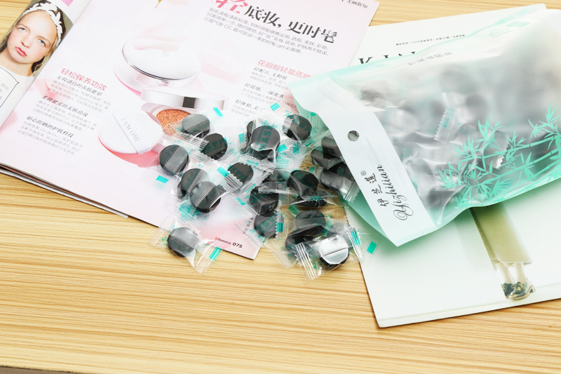 Black carbon bamboo wood compressed facial mask paper moisturizing and hydrating the mask 50 pills.