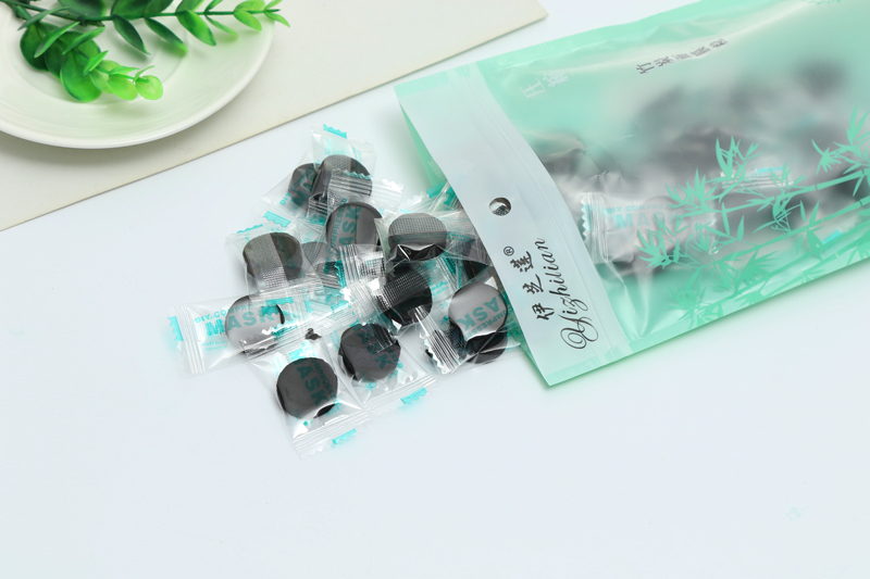Black carbon bamboo wood compressed facial mask paper moisturizing and hydrating the mask 50 pills.