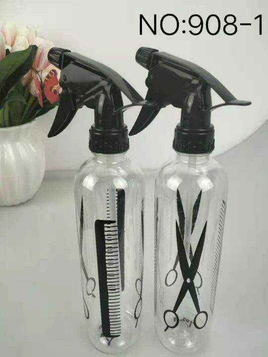 Hairdressing scissors, a spray bottle Hairdressing scissors, a spray bottle