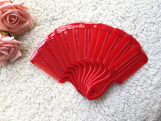 Plastic handle grate with double-sided fine tooth comb yuan store wholesale and direct commodity manufacturers