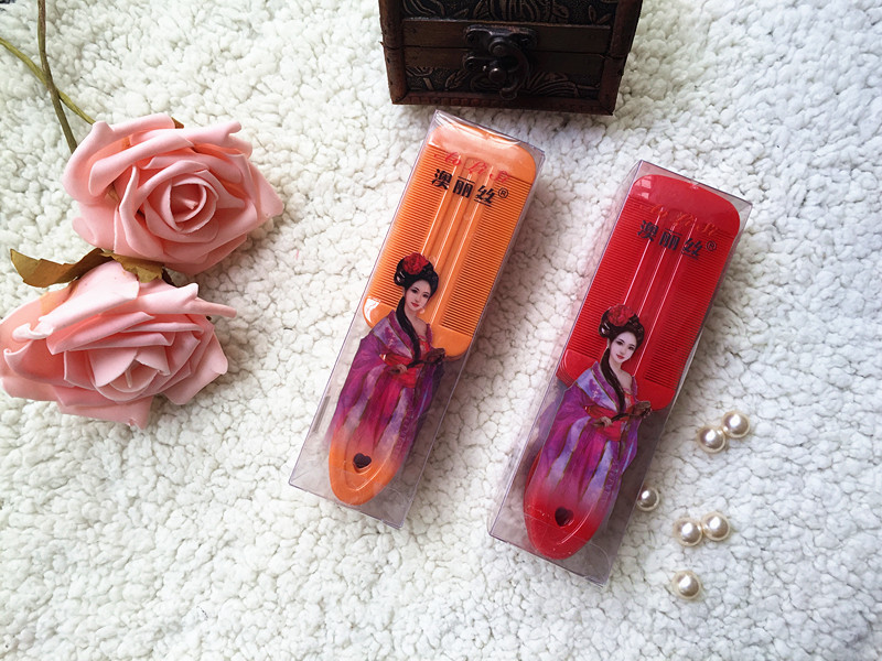 Plastic handle grate with double-sided fine tooth comb yuan store wholesale and direct commodity manufacturers