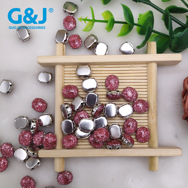 Oval egg-shaped clawless glue stone hand sewing on the four-hole claw drill hand-nailing bead button garment 
