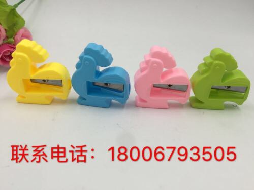 Miniature barrel guitar pencil sharpener.