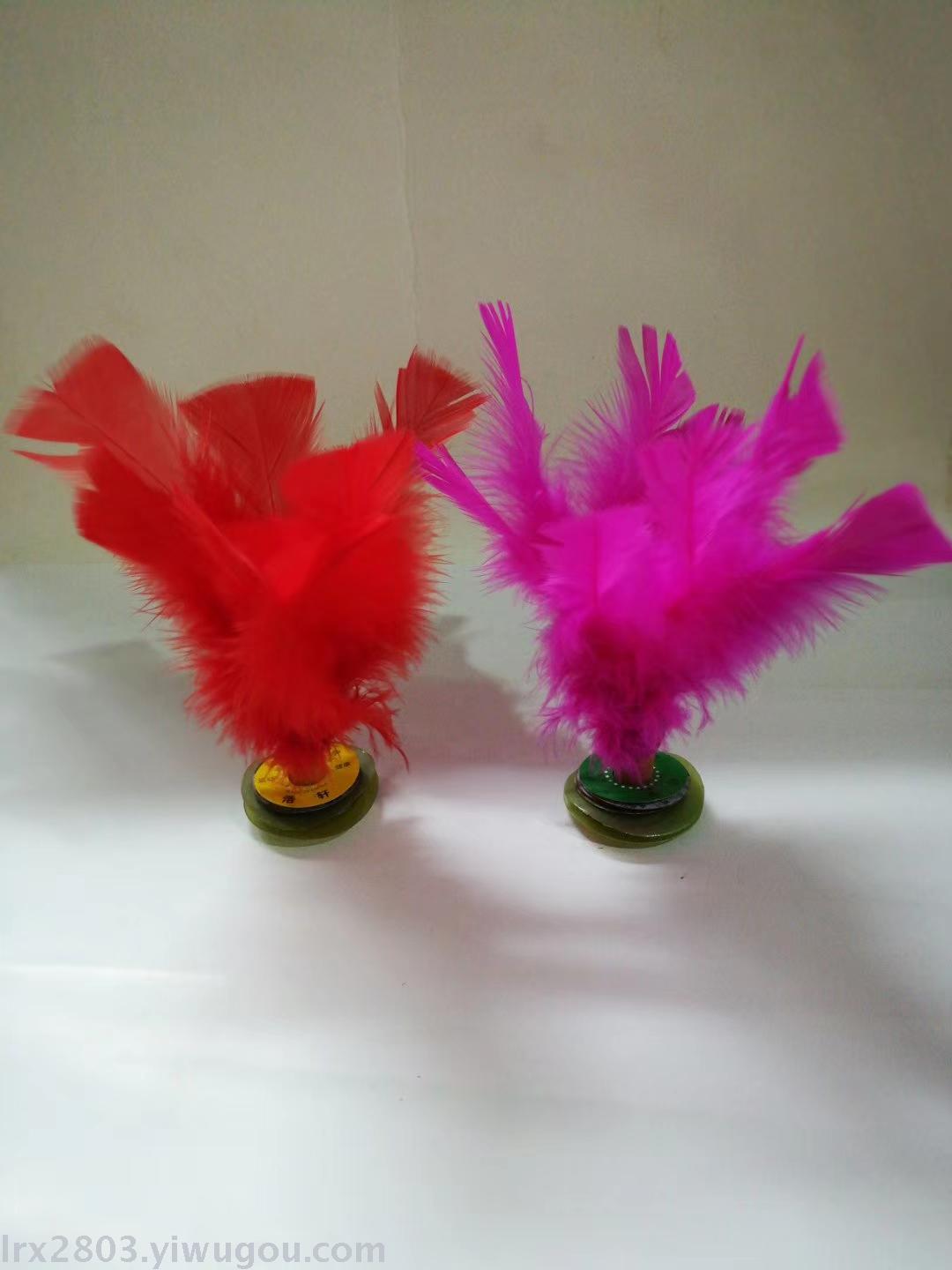 Feather shuttlecock and fire cock