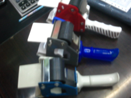 Carton sealing tape cutter handle sealing tape dispenser.