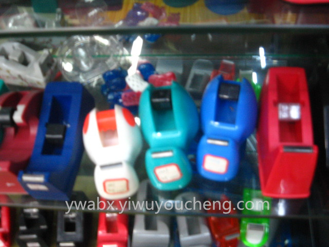 Tape dispenser Yiwu young into stationery adhesive tape cutter Tape dispenser Yiwu young into stationery adhesive tape cutter