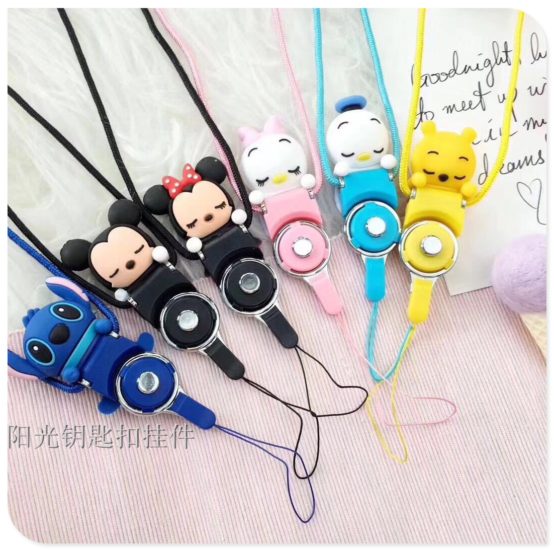 Creative two - in - one cartoon stereo childe mobile phone cord mobile phone rings hang neck rope.