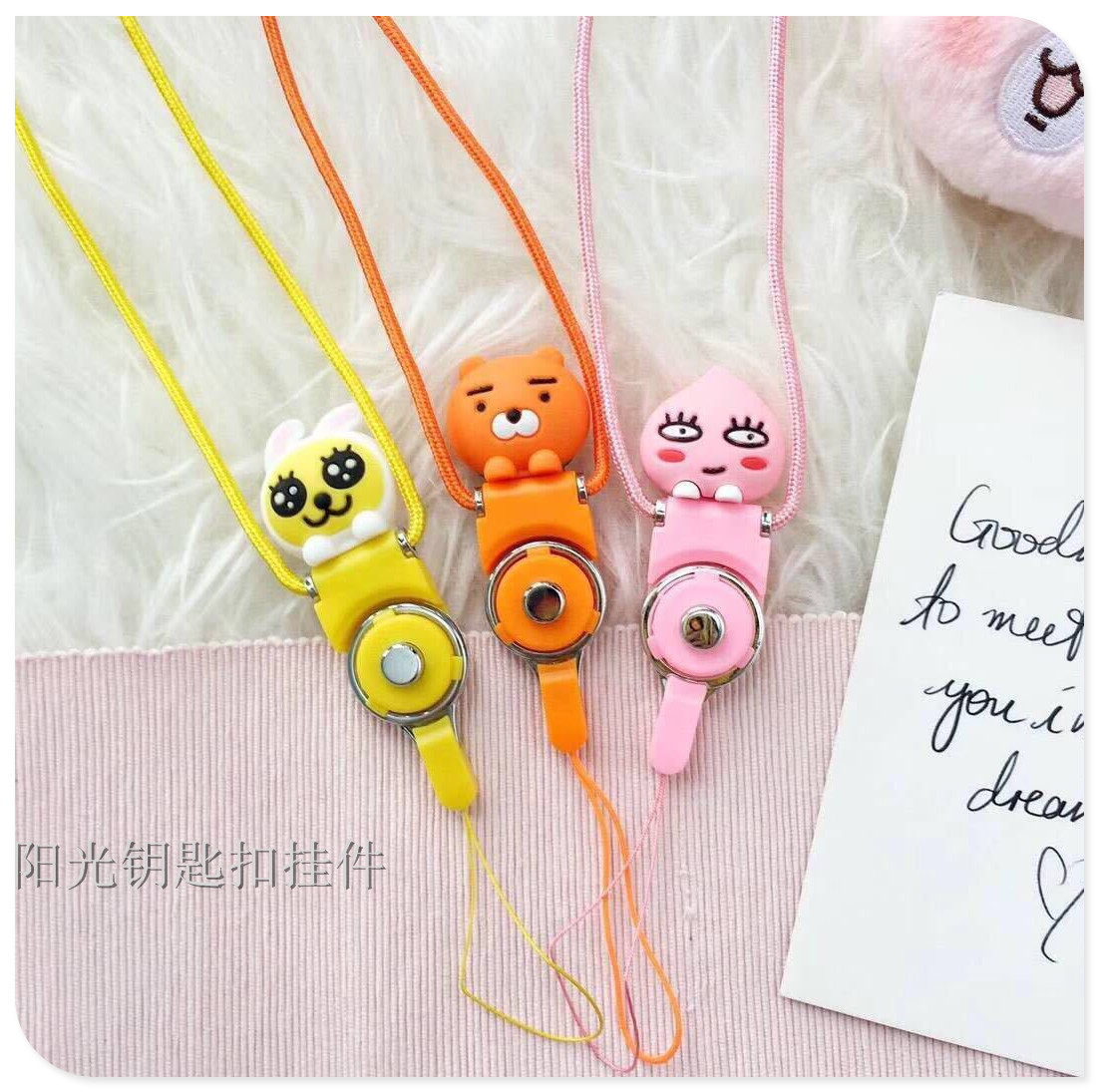 Creative two - in - one cartoon stereo childe mobile phone cord mobile phone rings hang neck rope. Creative two - in - one cartoon stereo childe mobile phone cord mobile phone rings hang neck rope.