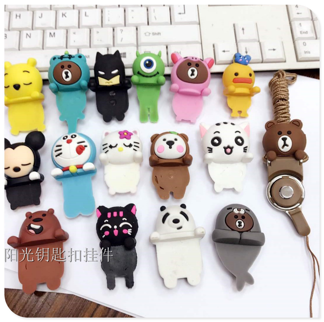Creative two - in - one cartoon stereo childe mobile phone cord mobile phone rings hang neck rope. Creative two - in - one cartoon stereo childe mobile phone cord mobile phone rings hang neck rope.