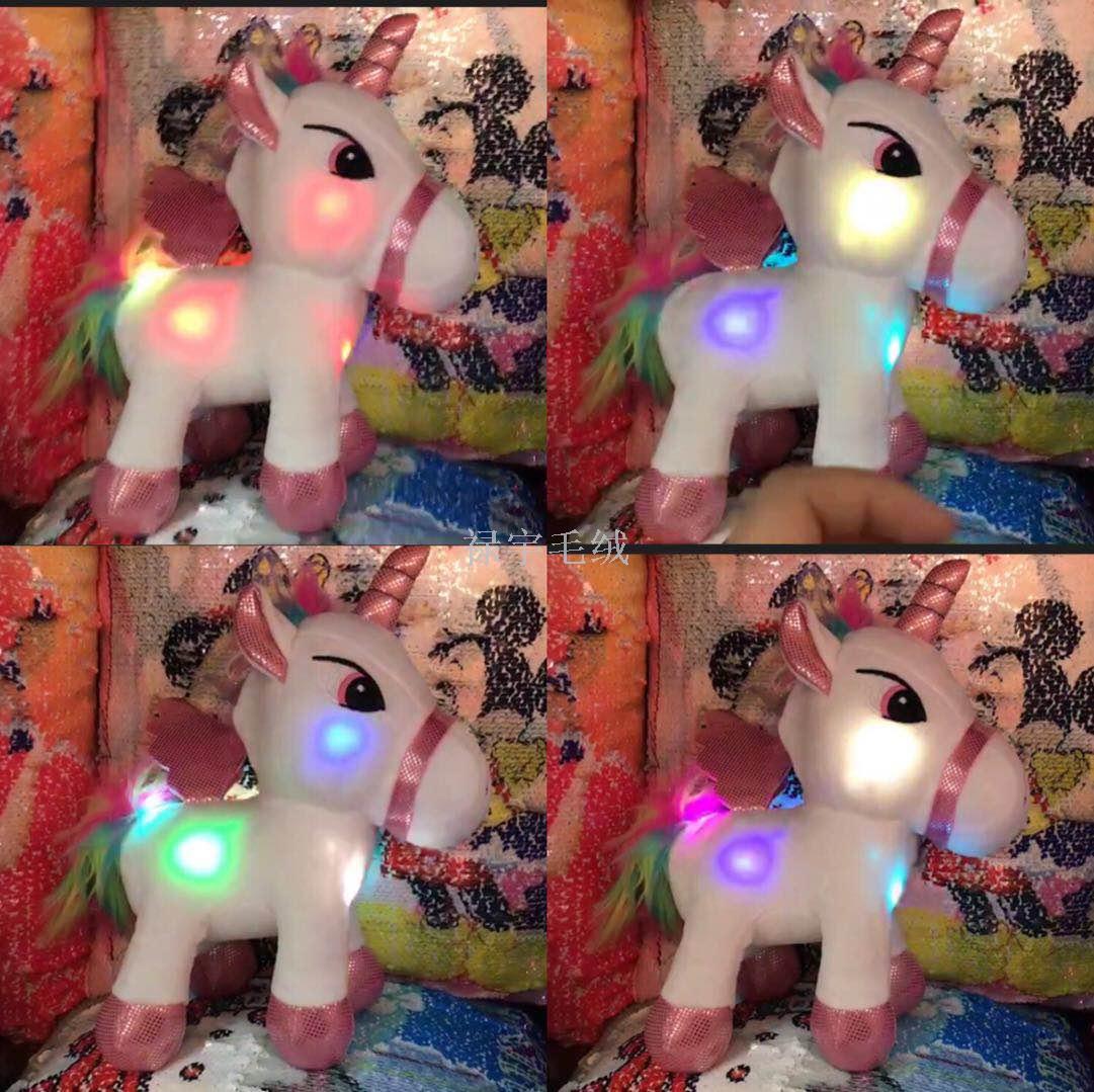 LED light music cute unicorns hang a toy doll, stuffed animal, baby, baby, baby, baby.