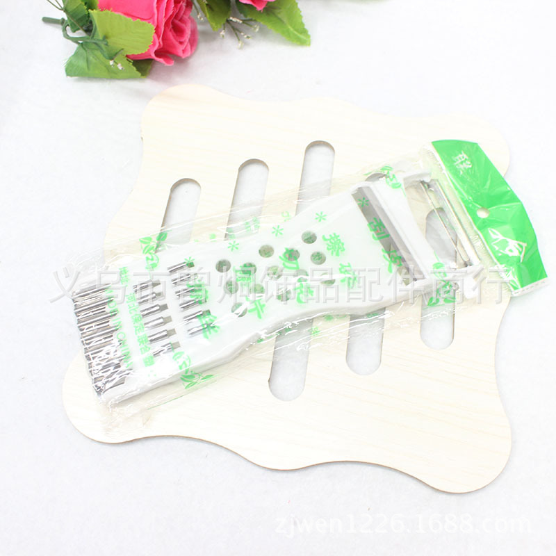 White multi-function fruit fruit paring knife Planer Planer planing fruit peeler dollar wholesale White multi-function fruit fruit paring knife Planer Planer planing fruit peeler dollar wholesale