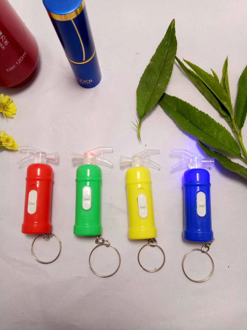 A Fire extinguisher has added a key chain LED key chain lamp