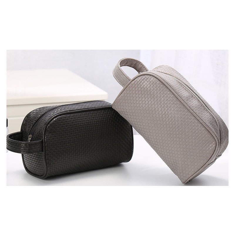 A New simple pure color men &#039;s leather storage bag multifunctional travel waterproof wash bag dust - proof makeup bag for women