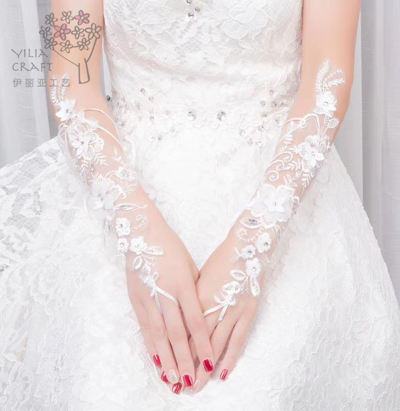 Han edition bride&#039;s gloves short and long wedding dress lace gloves white spring summer sun protection gloves.