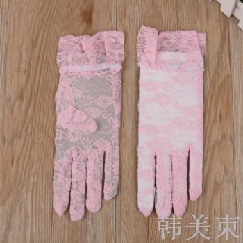 Spring and summer women&#039;s thin wedding ceremony gloves show gloves.