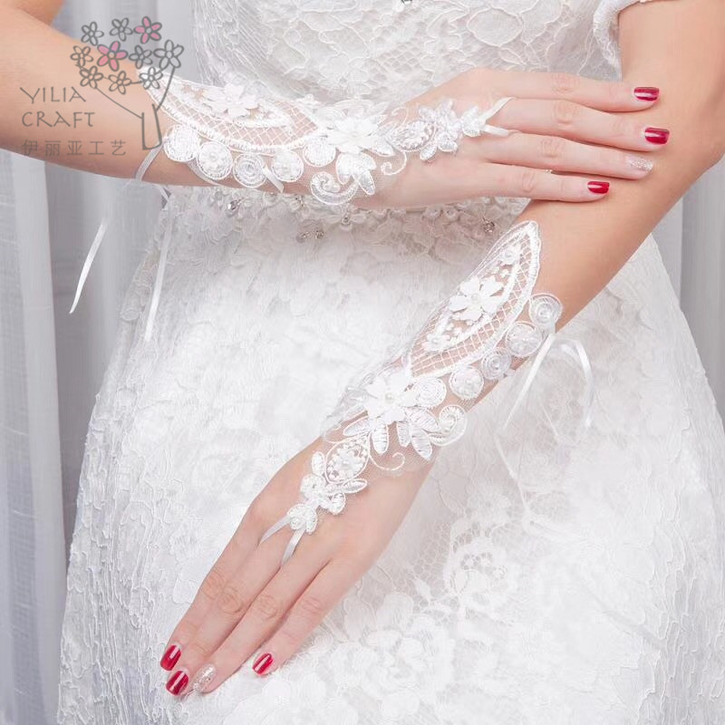 Elia Korean bride gloves wedding gown with lace embroidered mittens.
