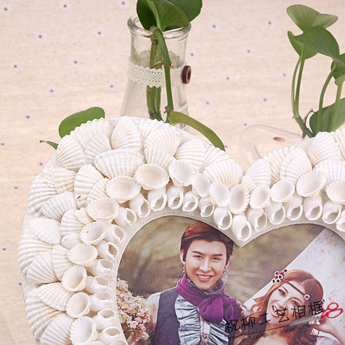Fashion photography props photo frame love Mediterranean beach shells table frame Fashion photography props photo frame love Mediterranean beach shells table frame