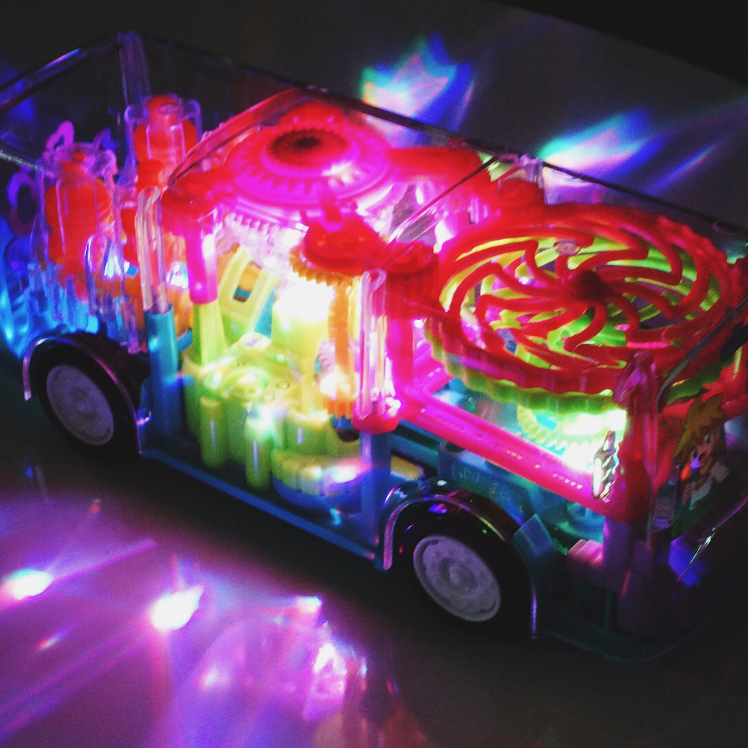 Cool Light Music Rotating Electric Bus Young Children Universal Gear Simulation Transparent Model Toy Car