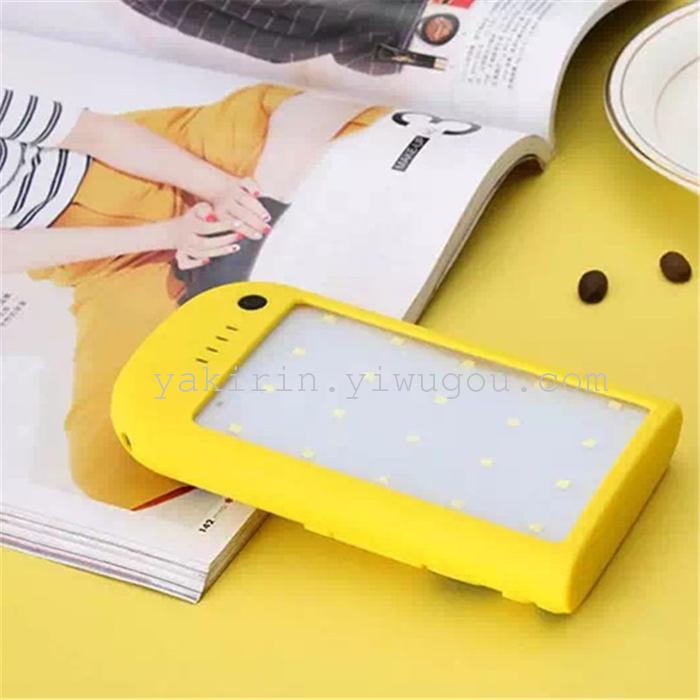 The new small yellow people solar camping light waterproof solar LED light charging treasure