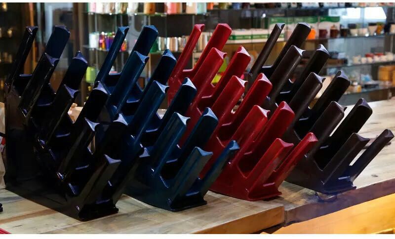 Four - grid plastic paper cup holder for the injection molding of the cup.
