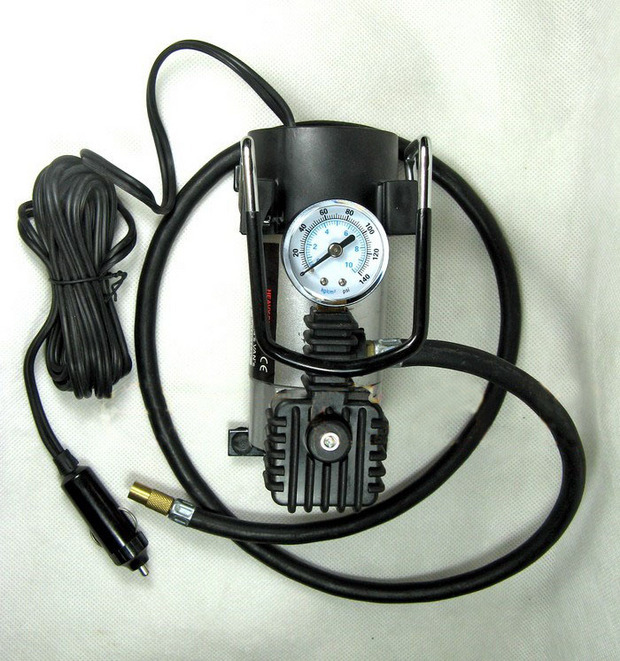 The car pump air pump automobile air pump cylinder tire pressure gauge electric portable gas pump metal copper core. The car pump air pump automobile air pump cylinder tire pressure gauge electric portable gas pump metal copper core.