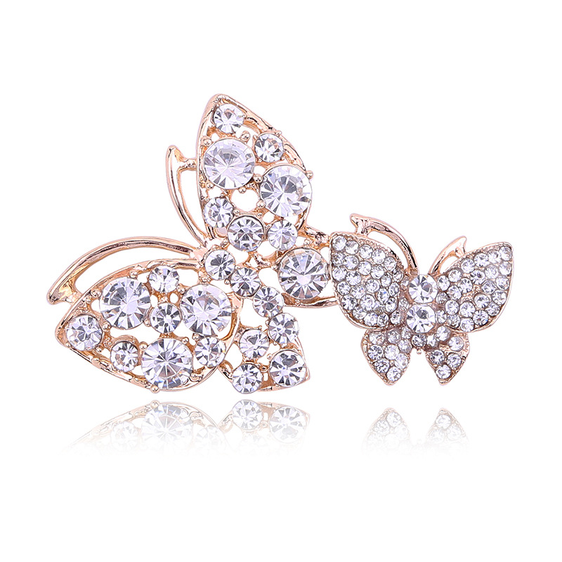 Europe and the United States cross-border supply manufacturers for Europe and the United States fashion atmosphere hollow-set diamond butterfly alloy brooch support customization