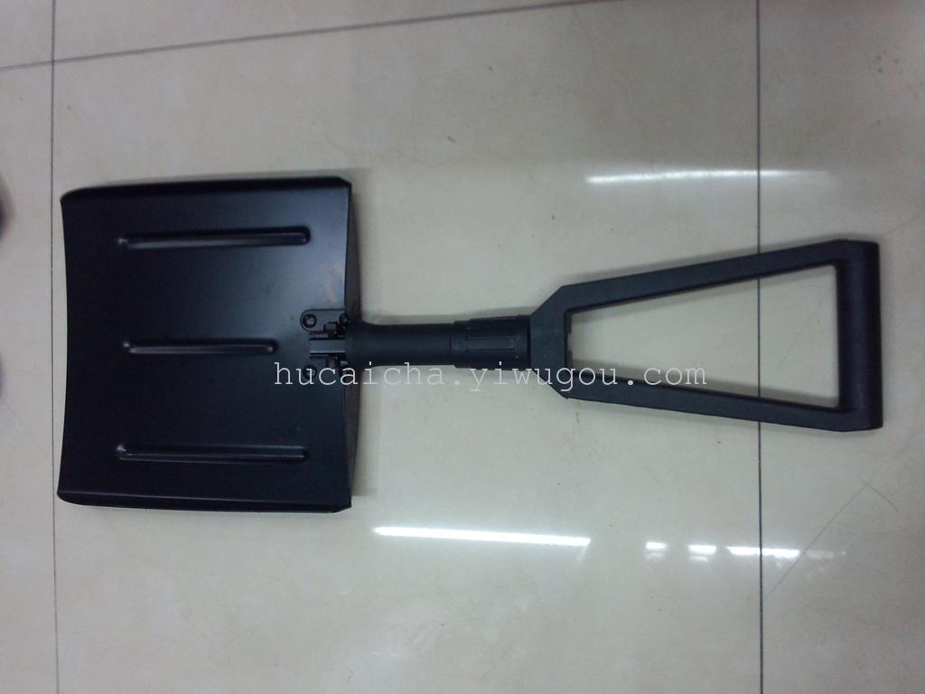 A large folding snow shovel