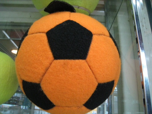 Tennis manufacturers advertising signature tennis from the football