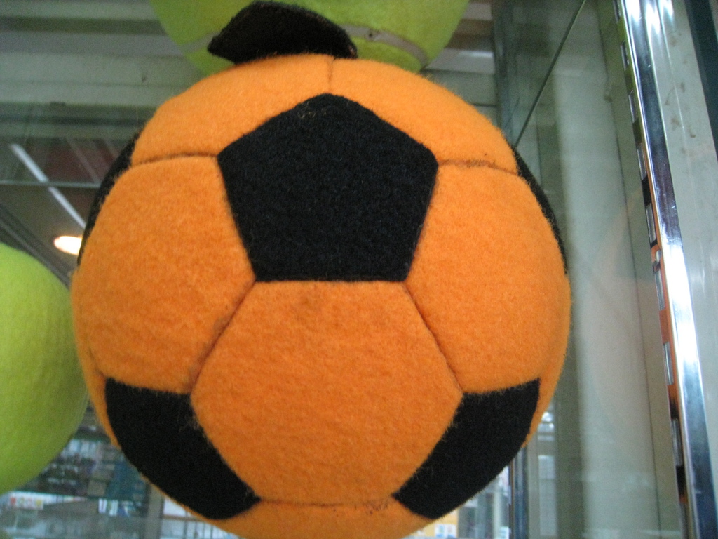 Tennis manufacturers advertising signature tennis from the football